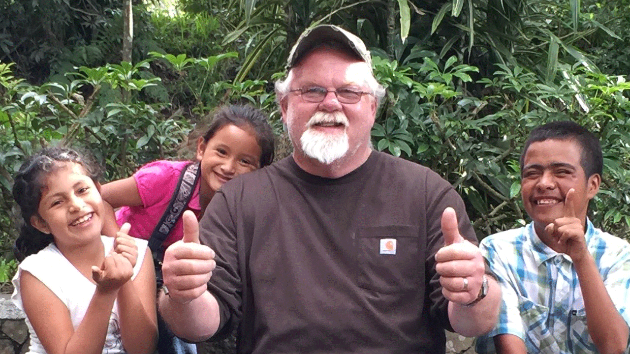 Mike with three kids at chastened 